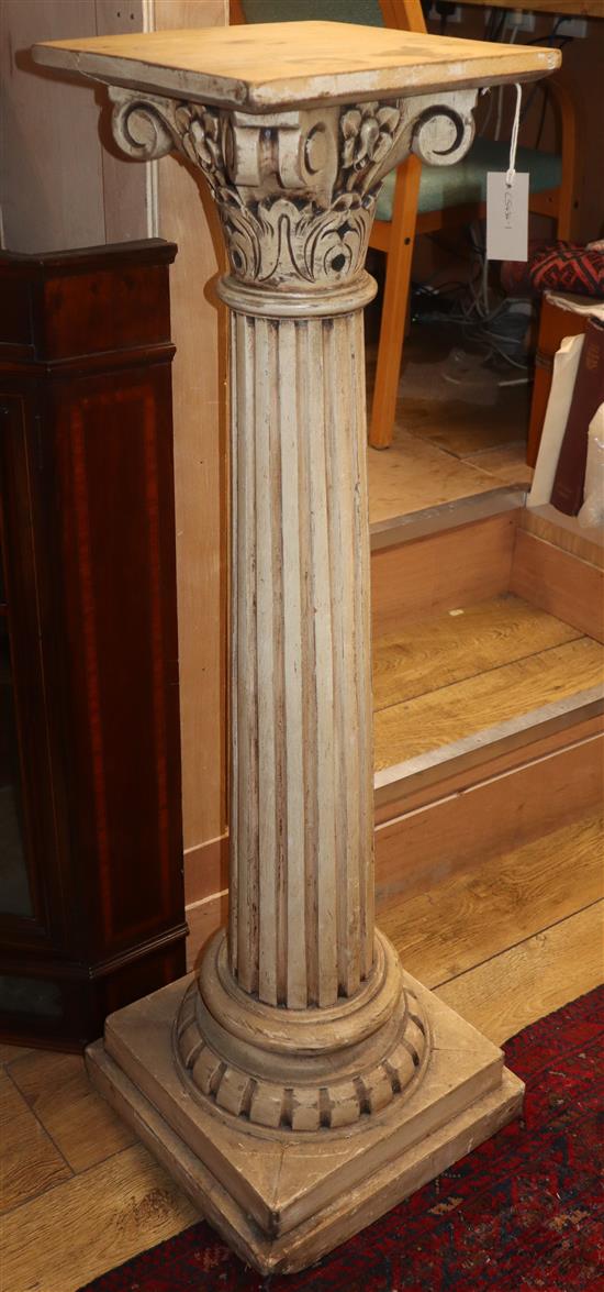 A carved pine Corinthian column H.117cm